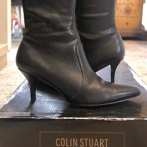 Black leather stiletto point toe boot